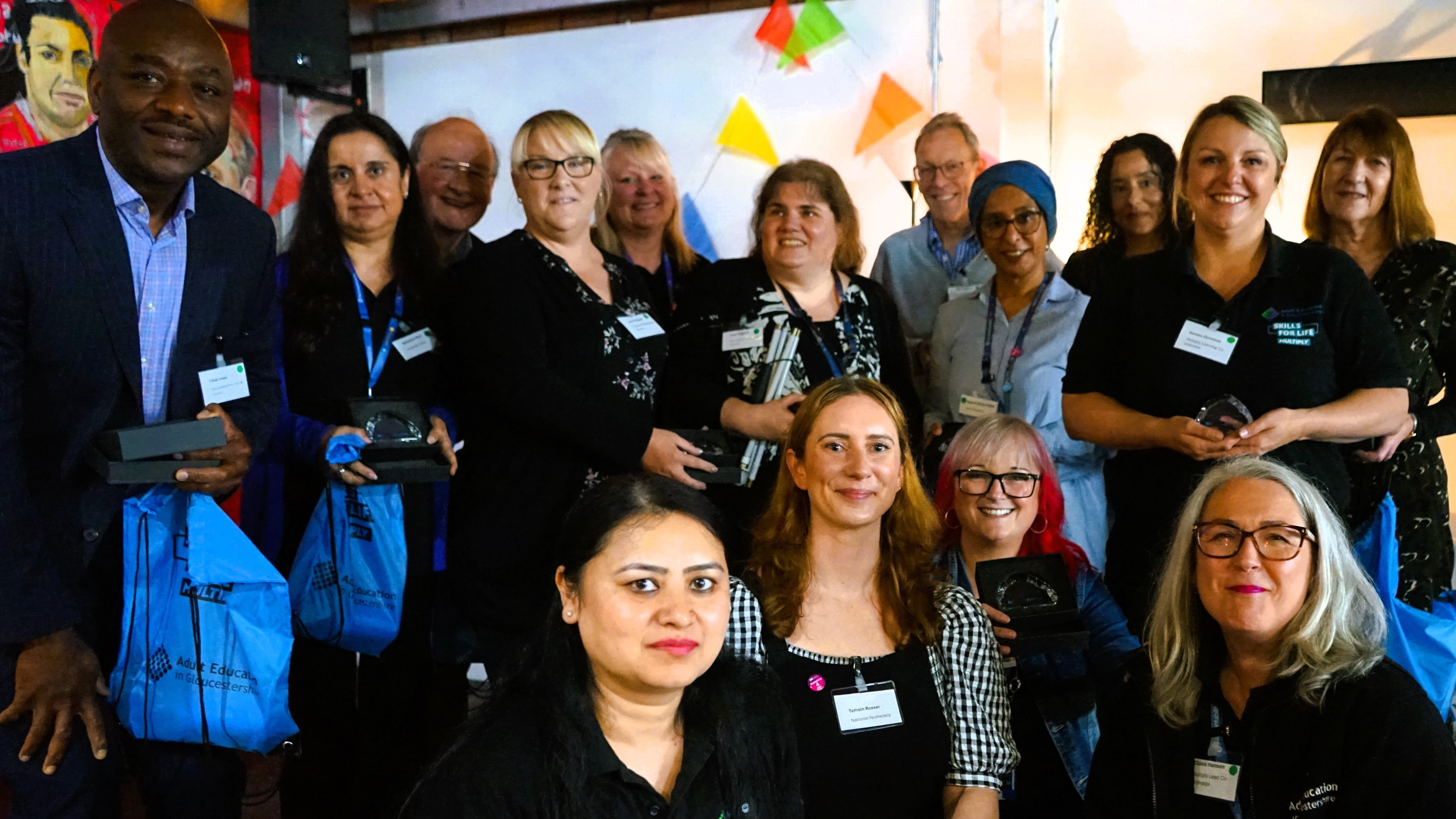 National Numeracy's Tamsin Roser and Gloucestershire County Council's Claire Hanson with trained Numeracy Champions on National Numeracy Day